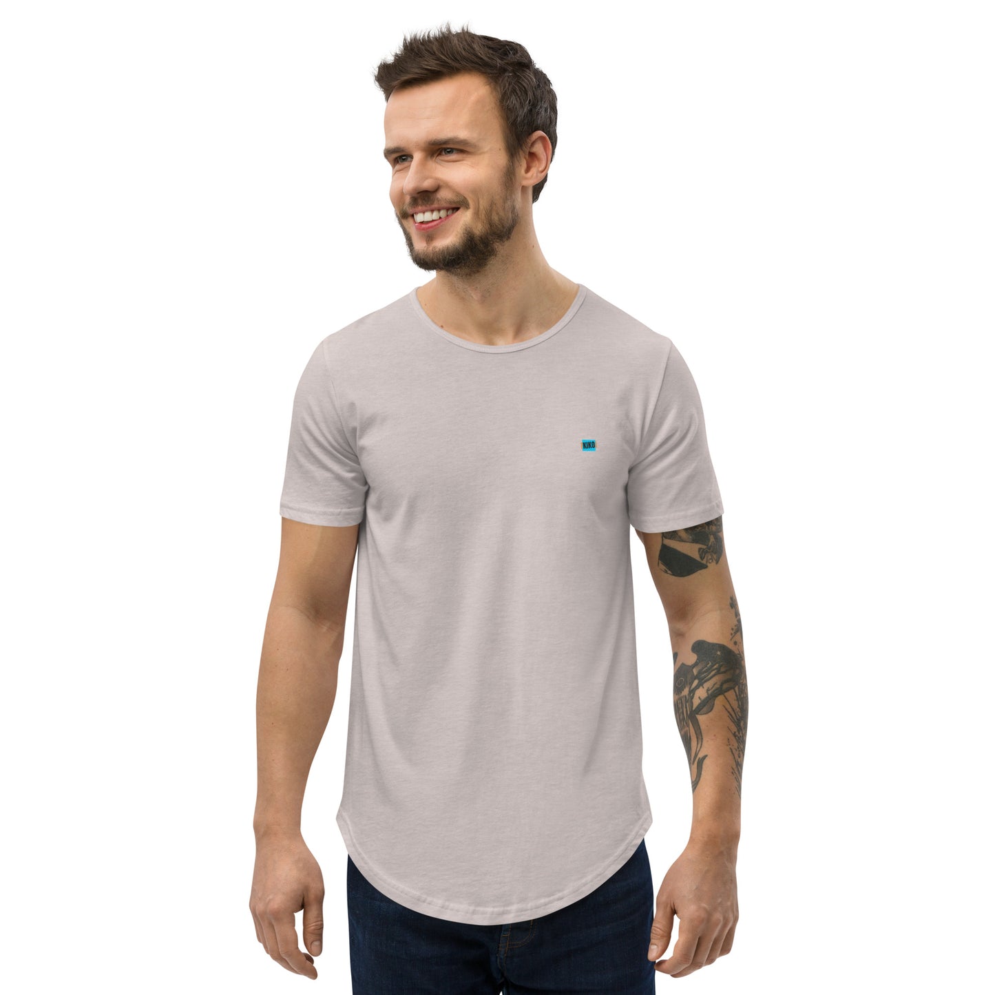 front facing male model wearing Kiko Brand logo heather cool grey gray men's curved hem t-shirt with short sleeves and a rounded hem. The fabric is soft and comfortable, making it perfect for casual outings or lounging at home.