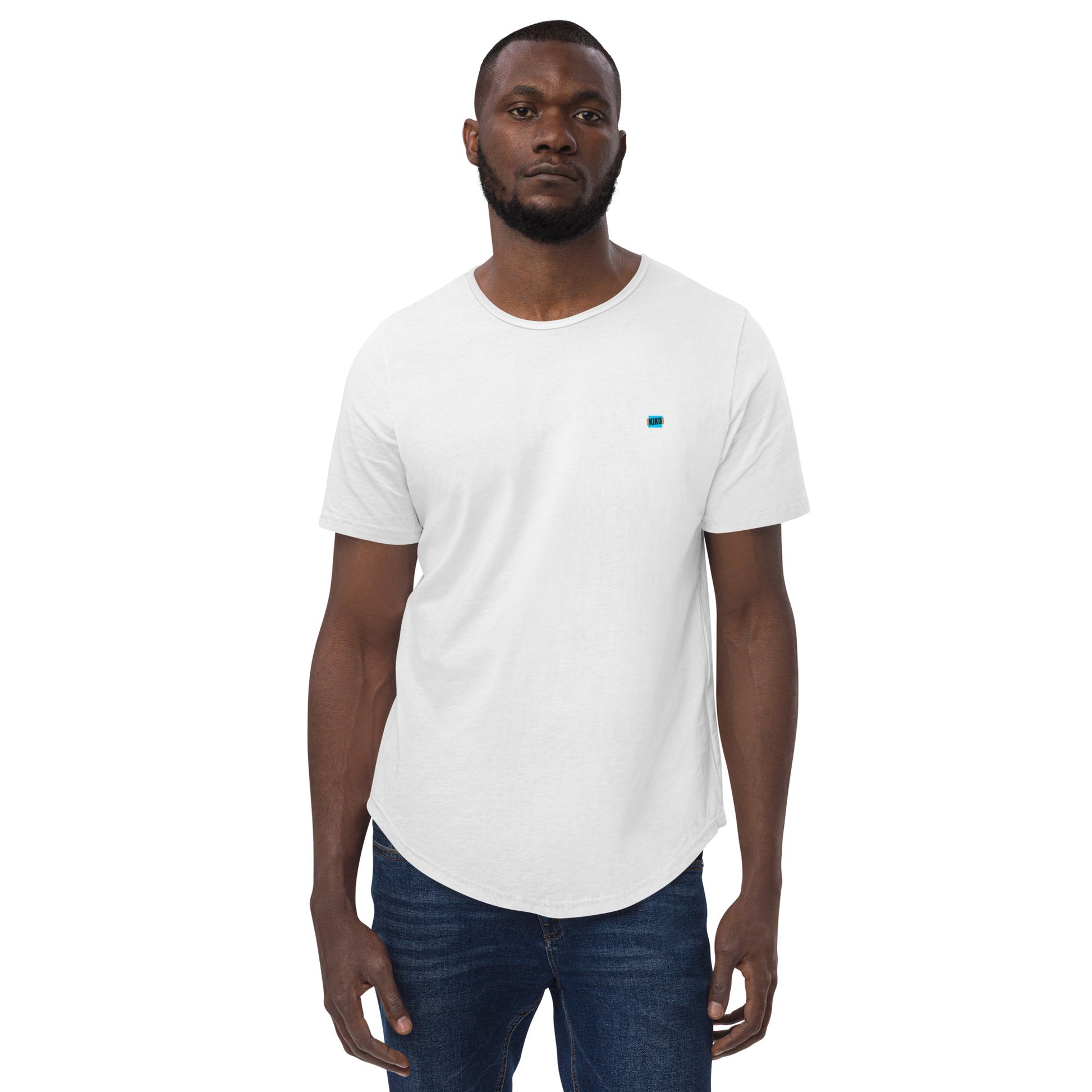 front facing male model wearing Kiko Brand logo white men's curved hem t-shirt with short sleeves and a rounded hem. The fabric is soft and comfortable, making it perfect for casual outings or lounging at home.