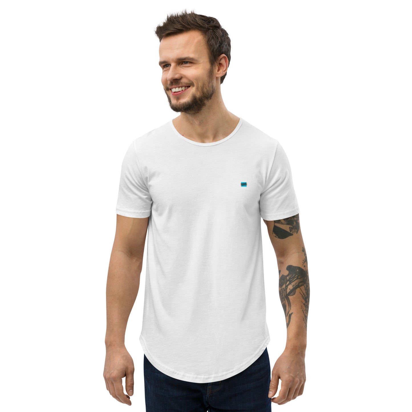 front facing male model wearing Kiko Brand logo white men's curved hem t-shirt with short sleeves and a rounded hem. The fabric is soft and comfortable, making it perfect for casual outings or lounging at home.